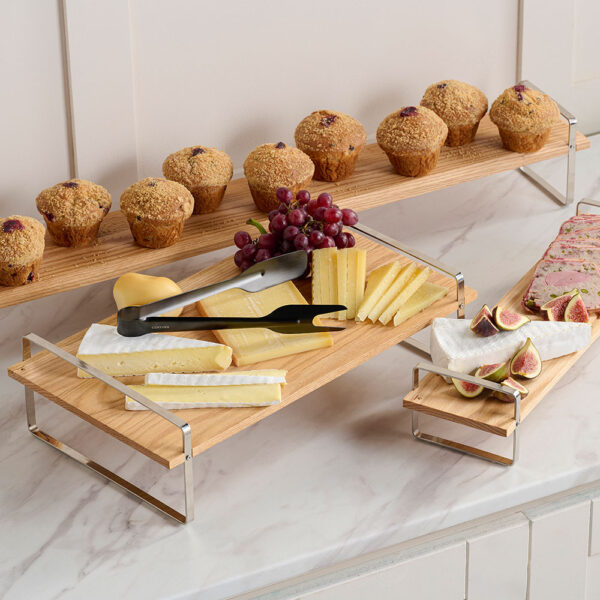 Comas Buffet Brown Risers with selection of cheeses and meat presented on a marble tabletop