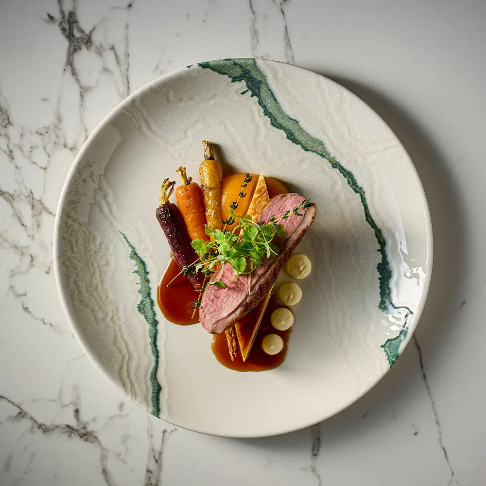 Churchill Inked Tide Accents Green Coupe Plate, serving up a premium fine dining duck dish