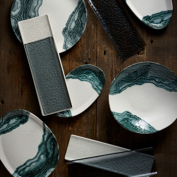 Churchill Inked Tide Black mixed with Viana Glass Dusk Tasting Trays on a dark background