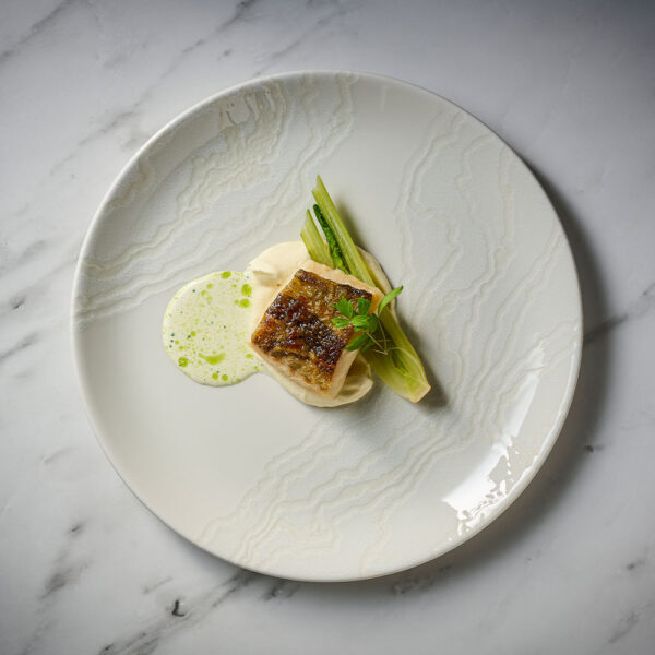 Churchill Inked Tide White Coupe Plate, presenting a fine dining and premium dish of fish with veg