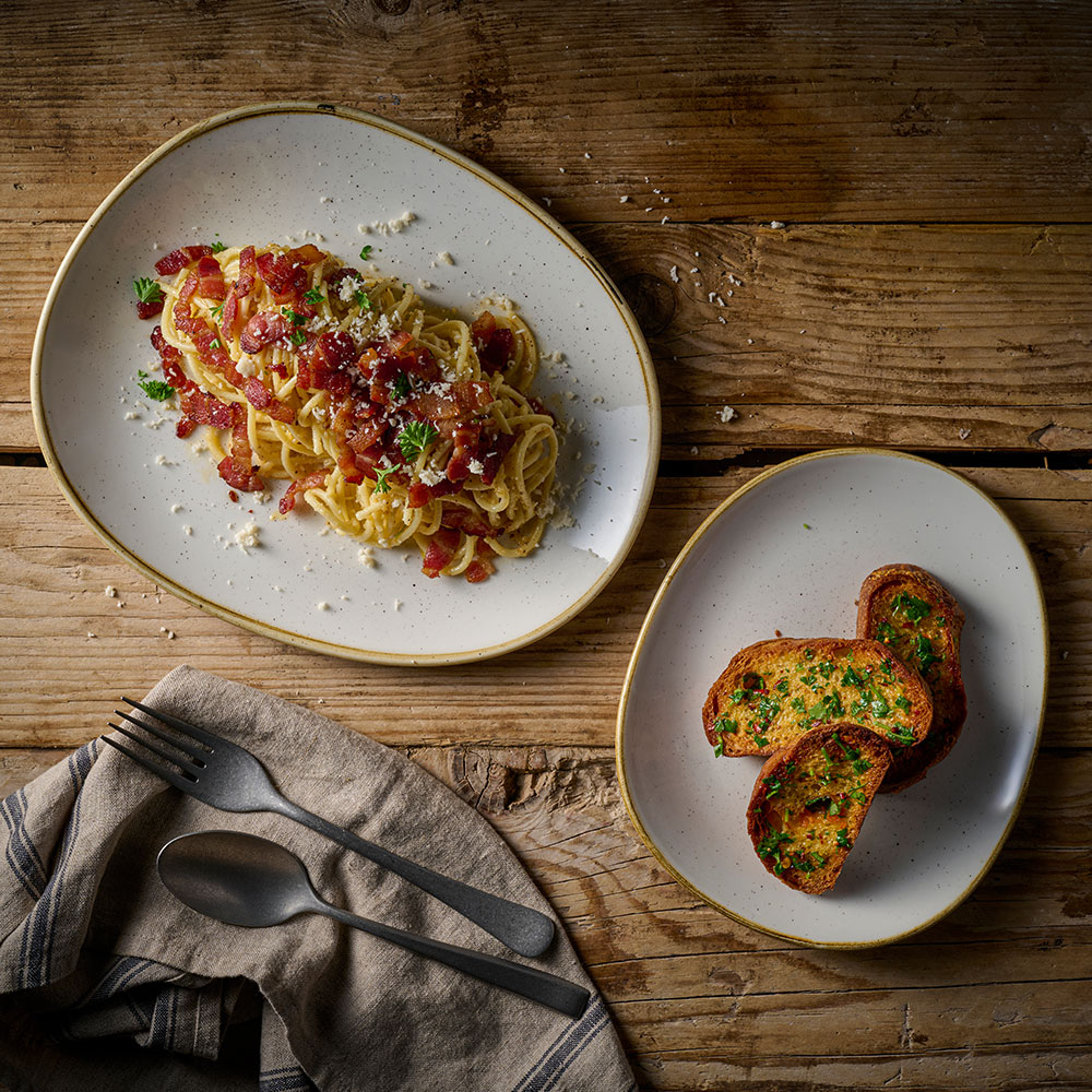 Churchill Stonecast Barley White opal plate with pasta and garlic bread